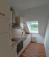 2-Zimmer-Dachgeschoßwohnung mit Blick ins Grüne! - Küchenansicht